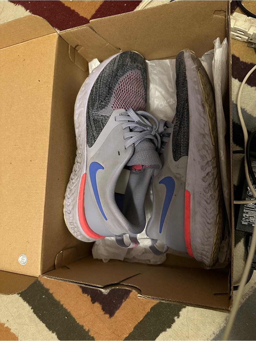 Nike Gray Sneakers with Blue Swoosh and Pink Accent